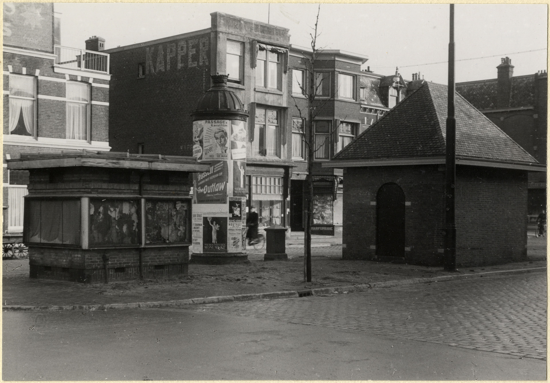 Kapper en reclame zuil